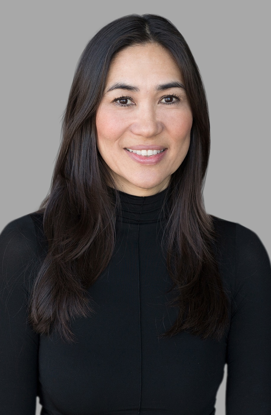 A professional headshot of Kristin Olson