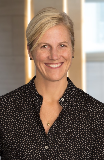 A professional headshot of Schuyler Heuer